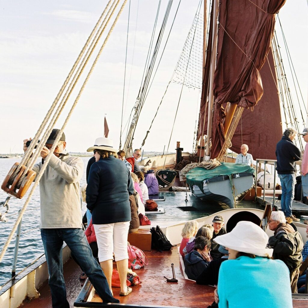 People on deck enjoying the river cruise